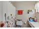 Functional bathroom featuring a toilet, vanity with ample counter space and a shower with a curtain at 10856 William Tell Dr, Orlando, FL 32821