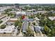 Aerial view of townhomes and surrounding neighborhood, set against a backdrop of city buildings at 117 E Concord St # 7, Orlando, FL 32801