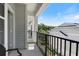 Cozy balcony with black metal railings offering a serene outdoor space with views of the surroundings at 117 E Concord St # 7, Orlando, FL 32801