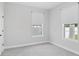 Bright bedroom with carpet flooring and light gray walls at 117 E Concord St # 7, Orlando, FL 32801