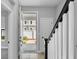 Bright entryway featuring wood-look tile flooring and a view of the front yard at 117 E Concord St # 7, Orlando, FL 32801