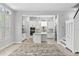 Bright, open kitchen with stainless steel appliances, a center island, and modern finishes at 117 E Concord St # 7, Orlando, FL 32801
