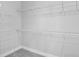 Well-organized walk-in closet with ample shelving and storage, maximizing space and convenience at 117 E Concord St # 7, Orlando, FL 32801