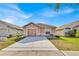 Cozy single-Gathering home with a well-kept lawn and a convenient driveway at 125 Owenshire Cir, Kissimmee, FL 34744