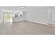 Bright living area with new flooring and ample natural light at 125 Owenshire Cir, Kissimmee, FL 34744