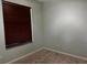 Bedroom with wall to wall carpet and window at 12610 Sawgrass Oak St, Orlando, FL 32824