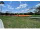 Community baseball field surrounded by well-kept green space, ideal for sports and recreation at 13016 Islamorada Dr, Orlando, FL 32837