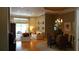 Open-concept living space with hardwood floors and sliders to the outdoor patio at 13016 Islamorada Dr, Orlando, FL 32837