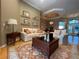 Inviting living room featuring a decorative ceiling, comfortable furniture, and a stylish area rug at 13016 Islamorada Dr, Orlando, FL 32837