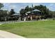 Gathering-friendly playground with climbing structures and slides set in a lush green community at 13016 Islamorada Dr, Orlando, FL 32837