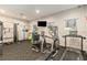 Well-equipped gym with treadmills, weights, and other fitness equipment for residents at 1308 Shinnecock Hills Dr, Davenport, FL 33896