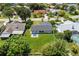 Aerial view of the neighborhood, showcasing mature trees, manicured lawns, and well-maintained homes at 17 S Flag Ct, Kissimmee, FL 34759