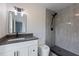 Updated bathroom featuring updated vanity, light fixtures, toilet and shower at 17 S Flag Ct, Kissimmee, FL 34759