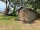 Wooden shed located in a large backyard at 171 Stanley Bell Dr, Mount Dora, FL 32757