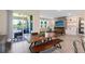 Spacious dining area leading to outdoor patio and features views of the backyard and seamless living at 17335 Million Lakes Ct, Clermont, FL 34714