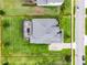 Aerial view showcasing the home's roof, pool, and expansive, well-maintained yard at 2260 Grayling St, Orlando, FL 32820