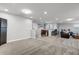 Spacious bonus room with a wet bar, plenty of room for entertaining, and comfortable seating arrangements at 2260 Grayling St, Orlando, FL 32820