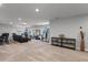 Large bonus room features a wet bar, entertainment area, and exercise equipment, perfect for relaxation and recreation at 2260 Grayling St, Orlando, FL 32820