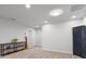Neutral bonus room offers versatile space, complemented by a console table and smooth carpet at 2260 Grayling St, Orlando, FL 32820