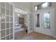 Bright foyer with an office on the left, showcasing an open and inviting layout at 2260 Grayling St, Orlando, FL 32820