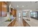 Bright kitchen featuring stainless appliances, granite countertops, and a dining area at 2260 Grayling St, Orlando, FL 32820