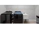This spacious laundry room is equipped with modern appliances and a utility sink for added convenience at 2260 Grayling St, Orlando, FL 32820