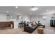 Entertaining living room with a wet bar, comfortable seating, and a television at 2260 Grayling St, Orlando, FL 32820