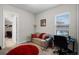 Cozy office space featuring a comfortable sofa and a dedicated work area near a window at 2260 Grayling St, Orlando, FL 32820