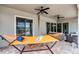 Cozy screened patio featuring a comfortable hammock and ceiling fans for relaxation at 2260 Grayling St, Orlando, FL 32820