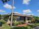 Charming one-story home with well-maintained landscaping and a paved walkway at 2316 E Margarita Ct, Kissimmee, FL 34741