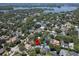 Aerial view of a neighborhood showcasing tree-lined streets and proximity to a lake and parks at 2339 Lafayette Ave, Winter Park, FL 32789