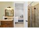 Beautiful bathroom features a granite countertop vanity and a modern glass door shower at 2339 Lafayette Ave, Winter Park, FL 32789
