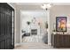Open-concept living room boasting a fireplace, modern decor, and plenty of natural light at 2339 Lafayette Ave, Winter Park, FL 32789