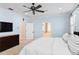Comfortable main bedroom with a ceiling fan and a view to the main bathroom at 2339 Lafayette Ave, Winter Park, FL 32789