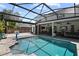 Relax by the pool surrounded by patio, and the outdoor kitchen and bar provide great entertaining options at 2339 Lafayette Ave, Winter Park, FL 32789
