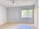 Bright bedroom with neutral walls, tiled flooring, ceiling fan, and ample natural light at 2468 Citrus Club Ln # 502, Orlando, FL 32839
