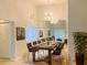 Modern dining room showcasing industrial table, contemporary lighting, and elegant decor at 2468 Citrus Club Ln # 502, Orlando, FL 32839