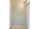 A simple foyer with a tile floor and a closet at 2468 Citrus Club Ln # 502, Orlando, FL 32839