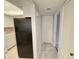 A simple hallway leading to the kitchen at 2468 Citrus Club Ln # 502, Orlando, FL 32839