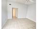 Inviting living area featuring an airy layout, tiled floors, neutral walls, and a ceiling fan at 2468 Citrus Club Ln # 502, Orlando, FL 32839