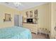 Bedroom showcasing neutral walls, modern ceiling fan, and comfortable furnishings at 2554 Stargrass Cir, Clermont, FL 34715