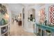 Hallway view showcases stylish décor and tiled flooring at 2554 Stargrass Cir, Clermont, FL 34715