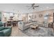 Open floor plan with living room, kitchen island, and seating, perfect for entertaining and Gathering gatherings at 2554 Stargrass Cir, Clermont, FL 34715