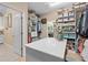 Spacious walk-in closet with custom shelving and storage solutions at 2554 Stargrass Cir, Clermont, FL 34715
