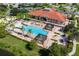 Aerial view of the community pool and clubhouse, highlighting the amenities at 266 Marcello Blvd, Kissimmee, FL 34746