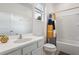 Bright bathroom with shower-tub combo, a geometric accent shower curtain, and a big mirror at 266 Marcello Blvd, Kissimmee, FL 34746