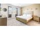 Comfortable bedroom with a neutral color scheme, plush bedding, and plenty of natural light creating a cozy atmosphere at 266 Marcello Blvd, Kissimmee, FL 34746