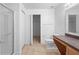 Bright bathroom with walk-in shower, vanity and toilet at 305 Grande Lake Dr, Daytona Beach, FL 32124