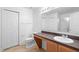 Bathroom featuring tile floor, vanity, toilet and a walk-in shower at 305 Grande Lake Dr, Daytona Beach, FL 32124