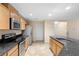 Kitchen with granite countertops and stainless steel appliances at 305 Grande Lake Dr, Daytona Beach, FL 32124